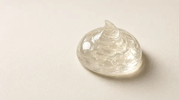 A thick, glossy swatch of clear petroleum jelly
