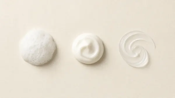 Three swatches in a row: foam cleanser, cream and lotion